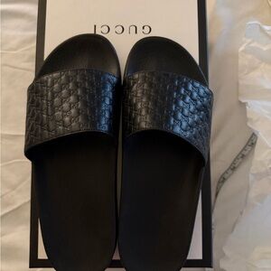 Gucci Embossed Black Slides